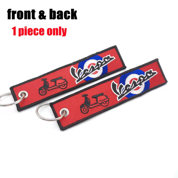 Υφασμάτινο Μπρελόκ Με Κεντητό Λογότυπο VESPA 13Χ3 εκ.